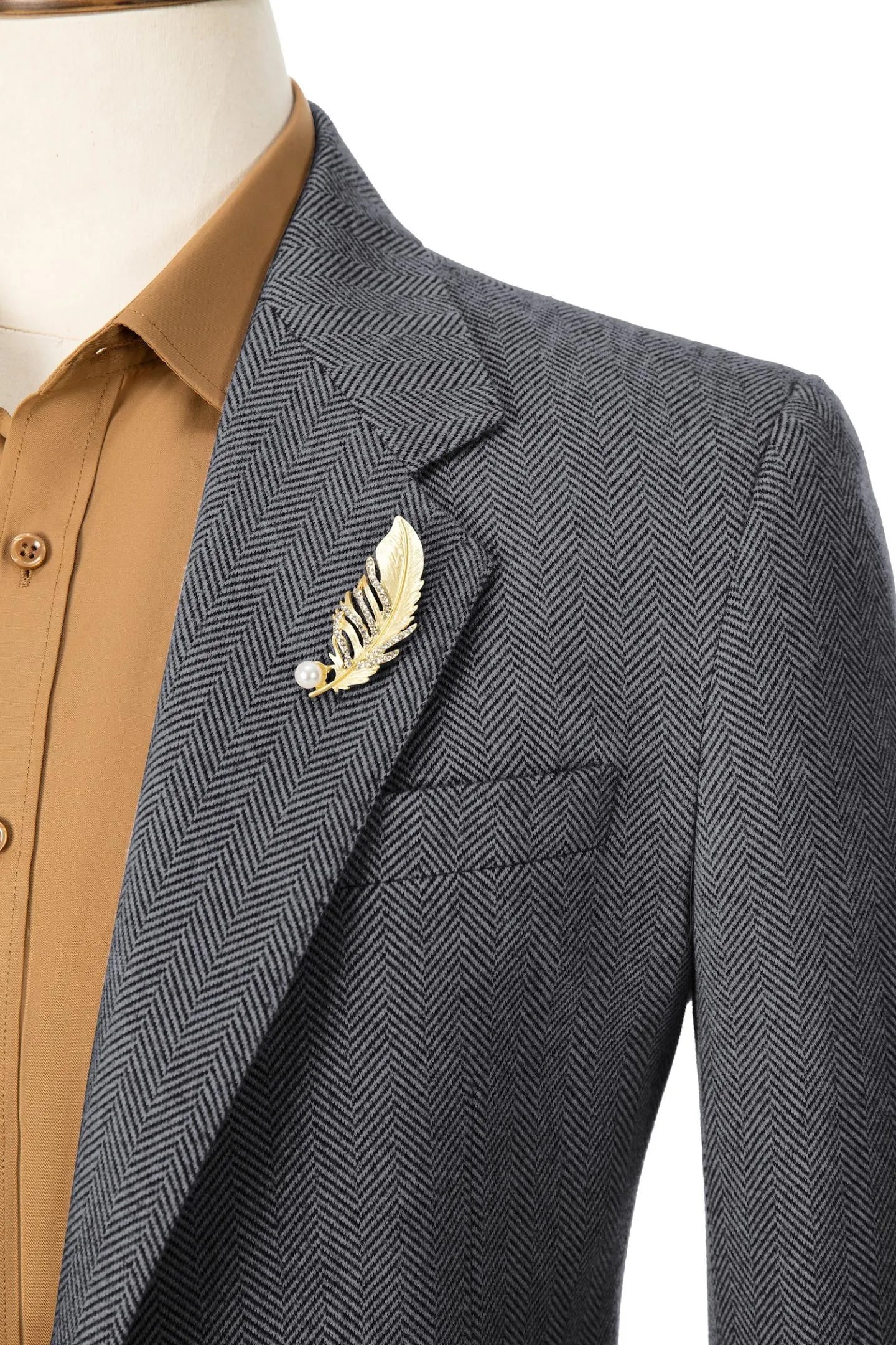 Close-up of collar on men's grey herringbone business blazer – emphasizing classic, refined design