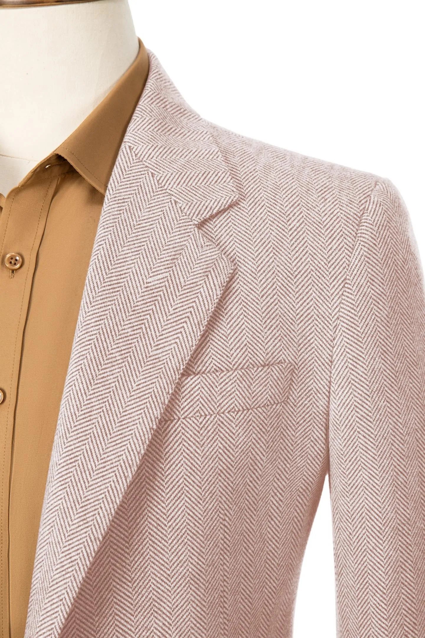 Close-up of the collar on men's retro herringbone leather pink business suit – showcasing classic design