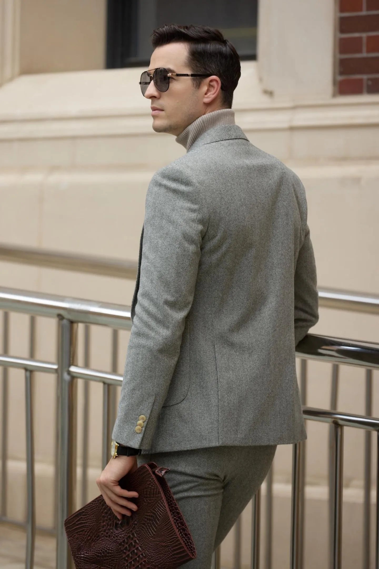 Back view of men's retro herringbone blazer – tailored business suit with herringbone texture