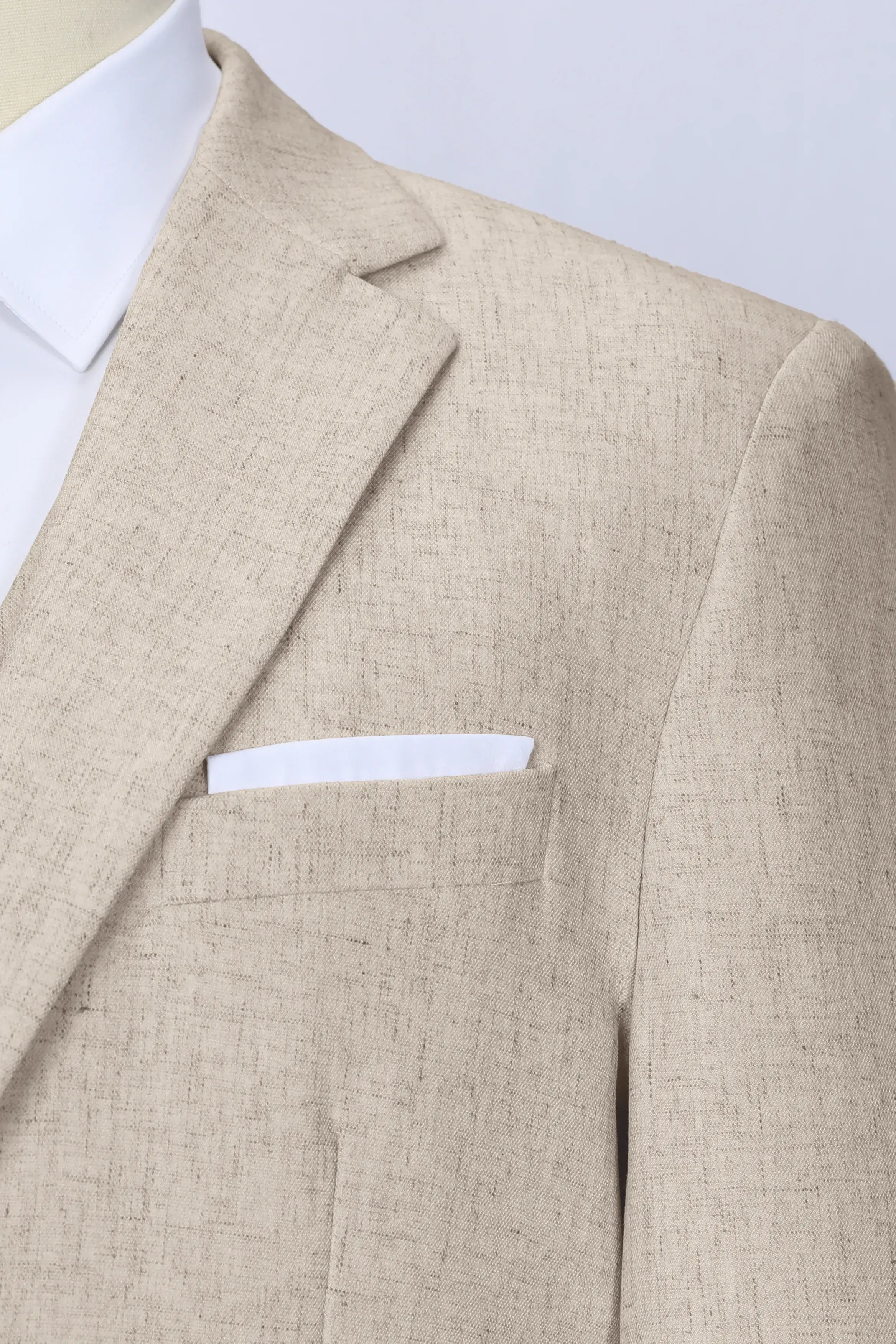 Close-up texture of champagne linen fabric for men’s summer suits