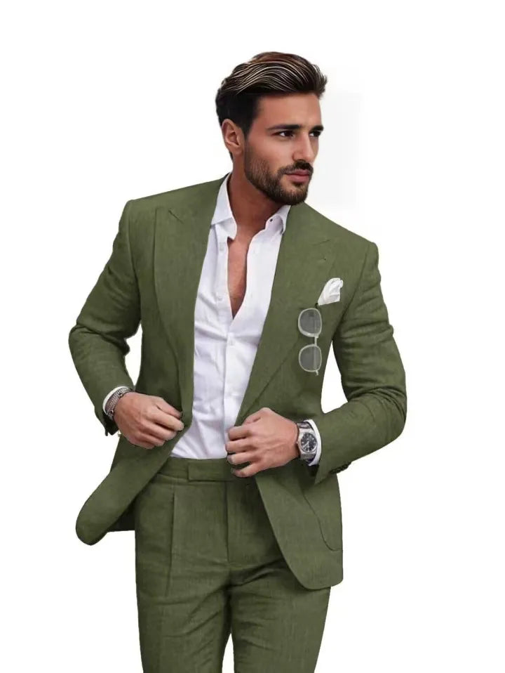 Close-up of men's green linen slim fit suit with peaked lapel blazer.