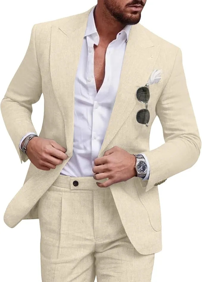 Close-up of men's light champagne linen slim fit suit with peaked lapel jacket.