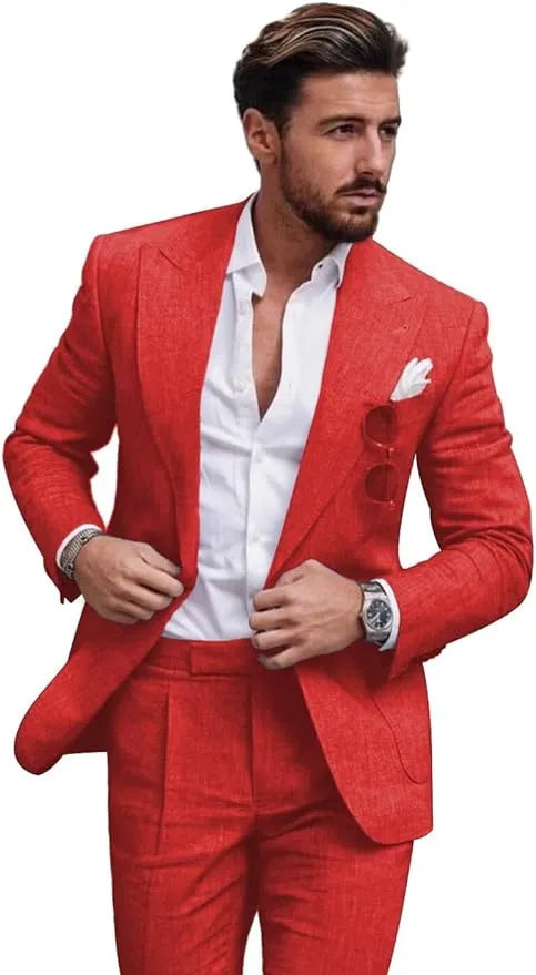 Man in red slim fit linen 2 piece summer suit with peaked lapel blazer and trousers, styled for prom or weddings.