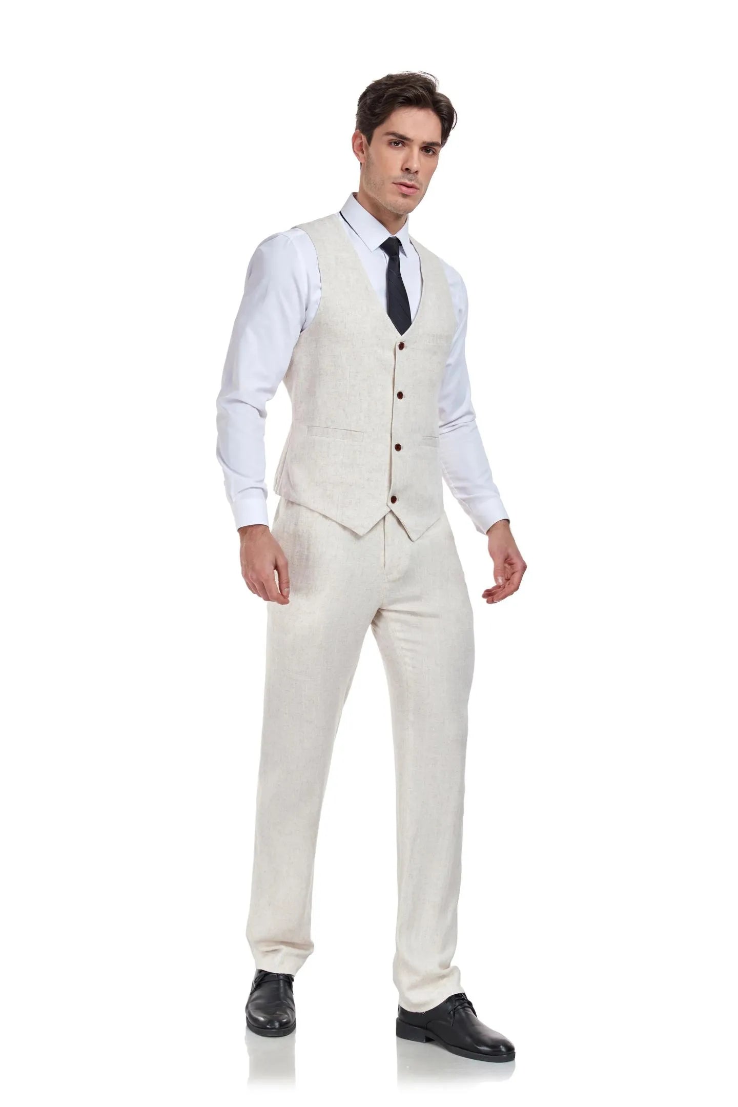 Full body front pose of men wearing beige linen 2 piece vest and pants – casual summer wedding style