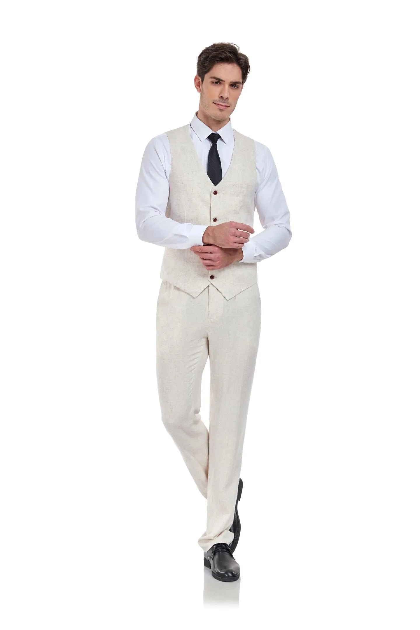 Side angle of men’s beige linen vest and pants set – slim fit lightweight summer suit
