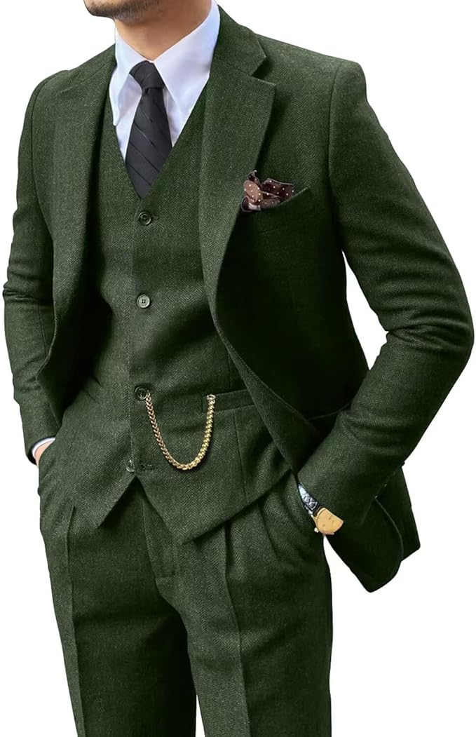 angled upper body close-up of slim fit green herringbone suit for men with vest and tie