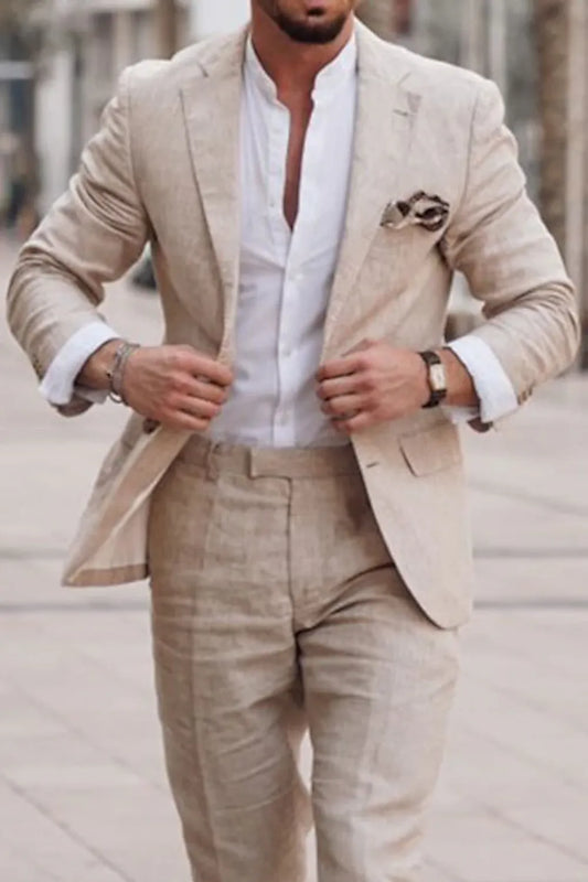Close-up of beige linen suit jacket showing texture and sharp tailoring