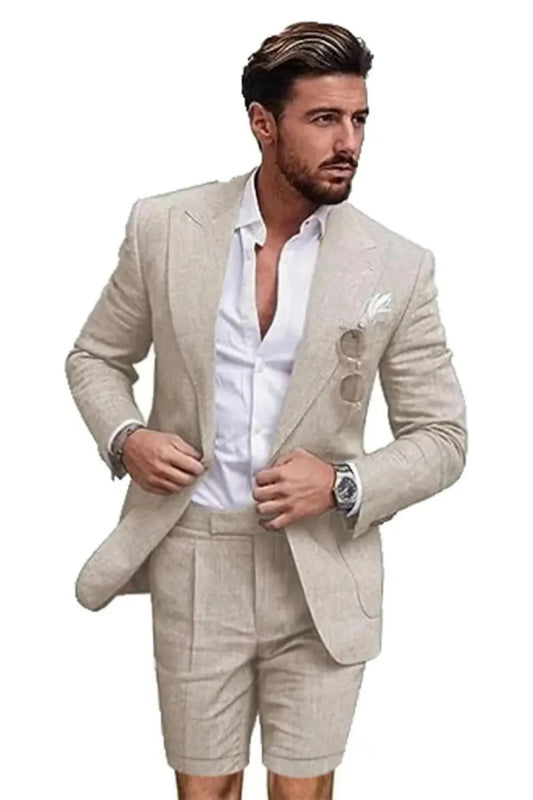 Close-up of beige linen slim fit 2 piece short suit – peaked lapel blazer with shorts and white shirt, summer outfit for men.