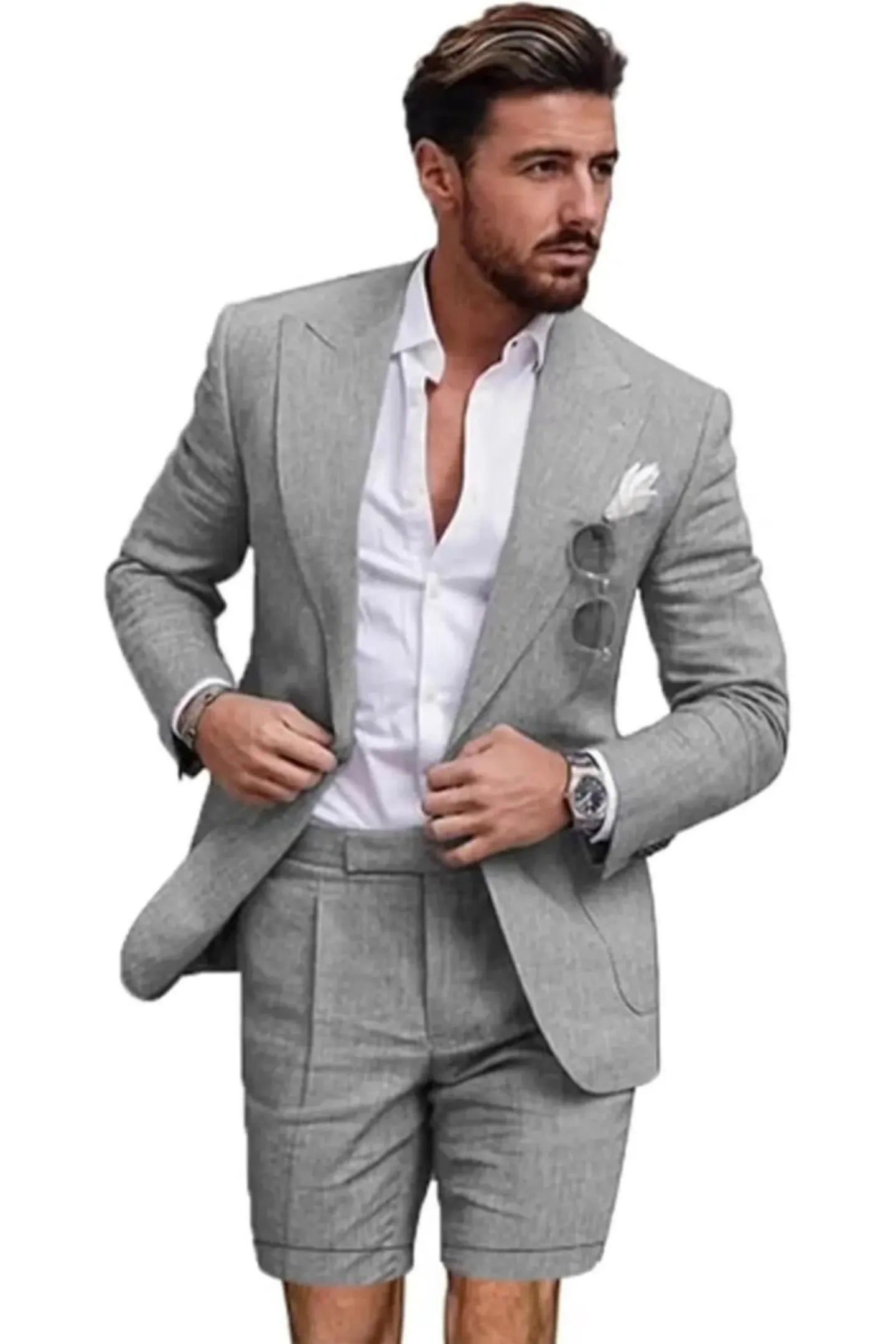 Close-up of grey linen slim fit 2 piece short suit – peaked lapel blazer with shorts and white shirt, summer outfit for men.