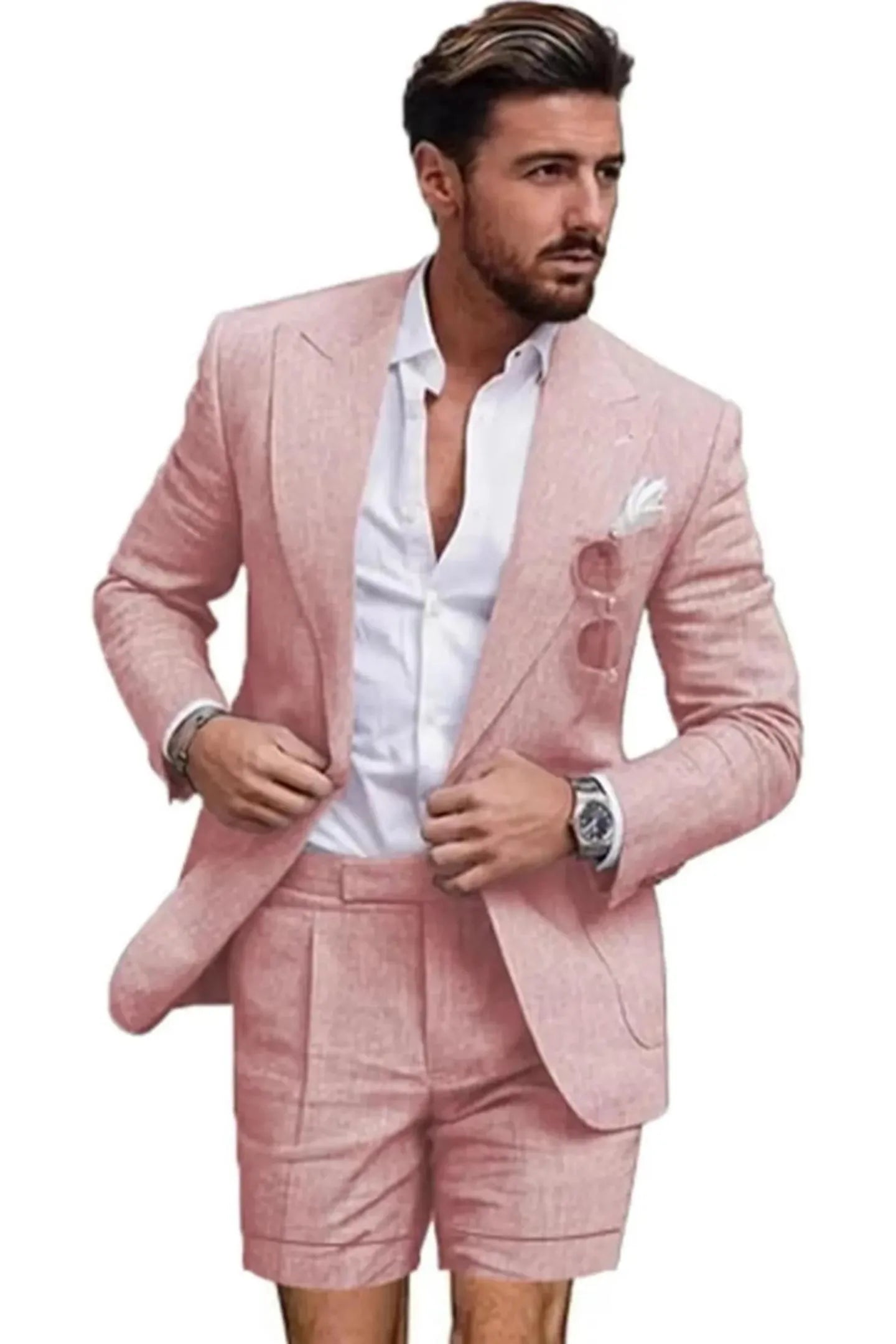 Front view of man in pink linen 2 piece short suit – slim fit peaked lapel blazer with shorts and white shirt for summer.