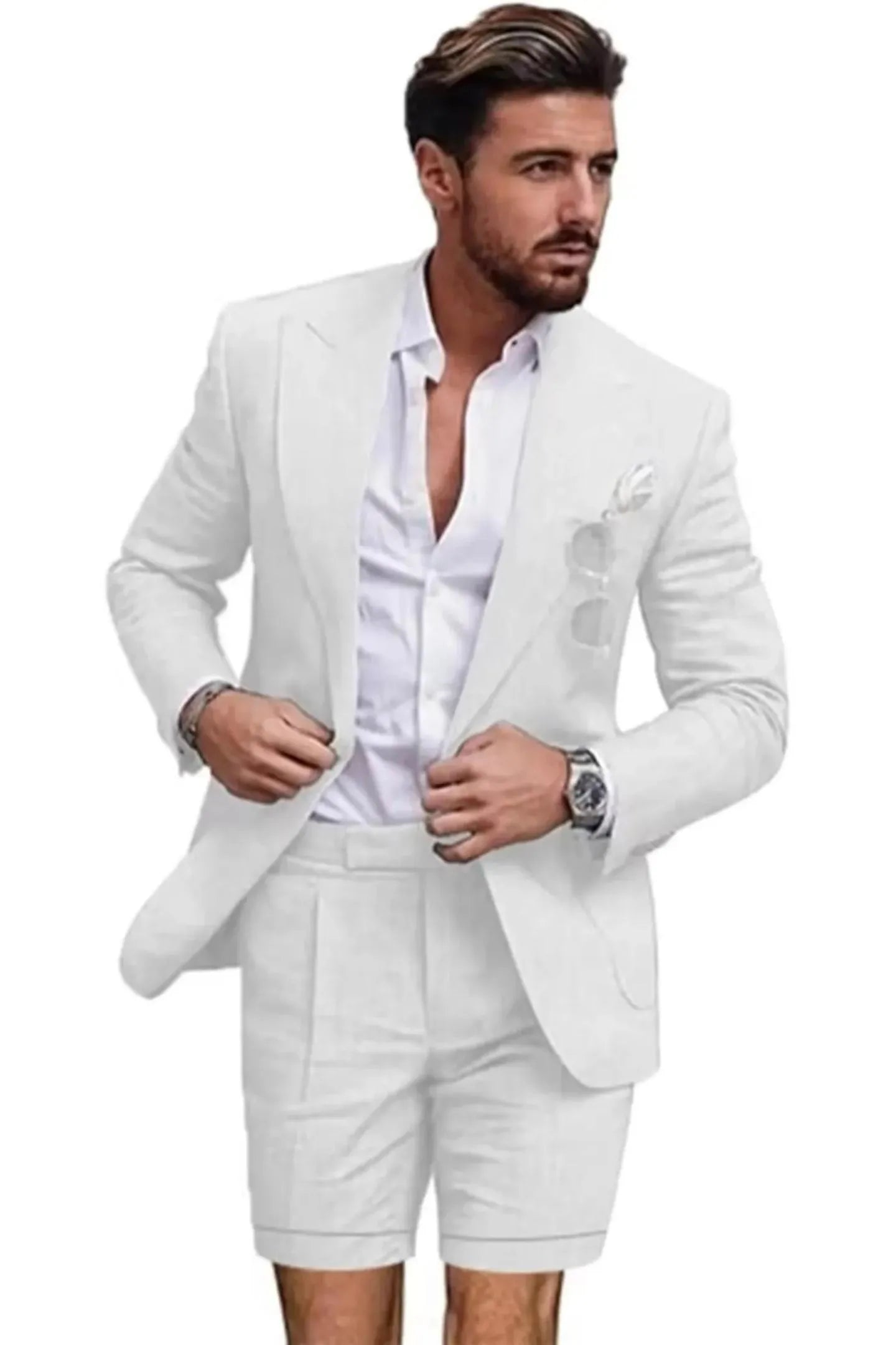 Front view of man in white linen 2 piece short suit – slim fit peaked lapel blazer with shorts and white shirt for summer.