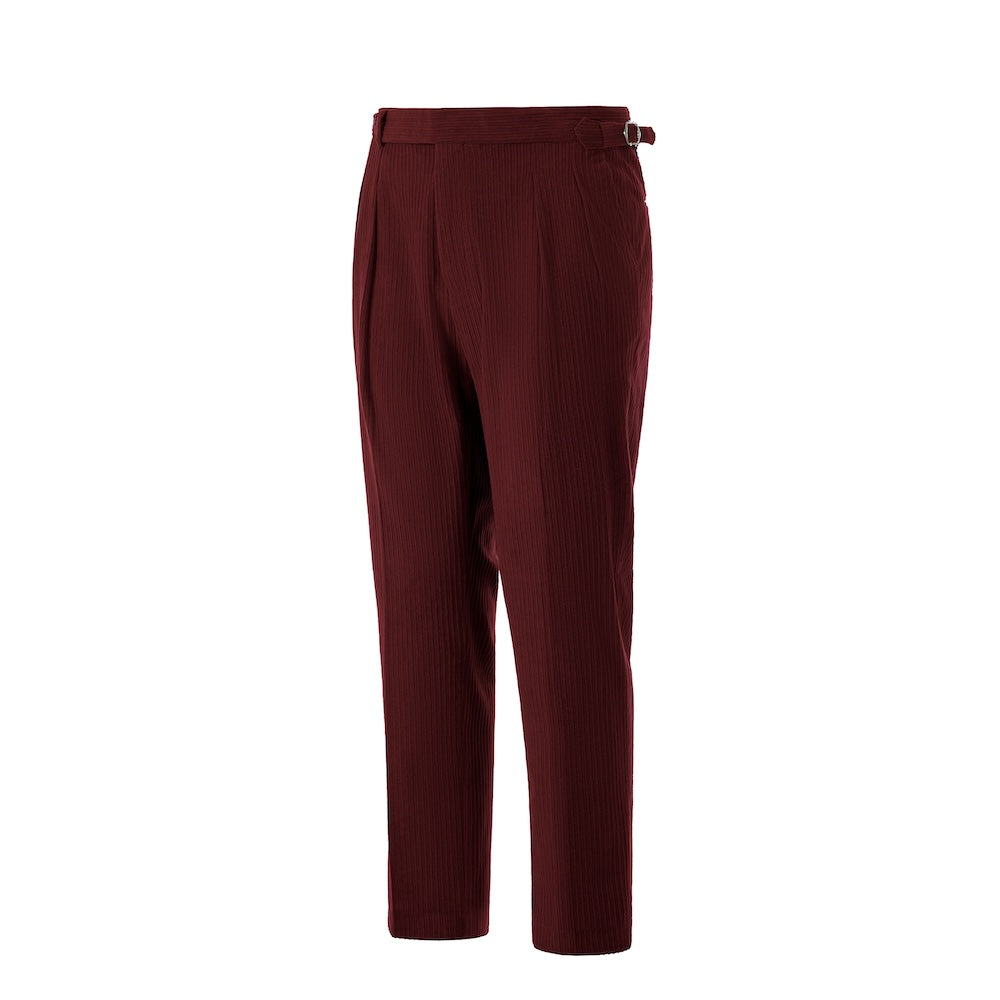 Side view of wine red corduroy pants – tailored leg and winter style finish
