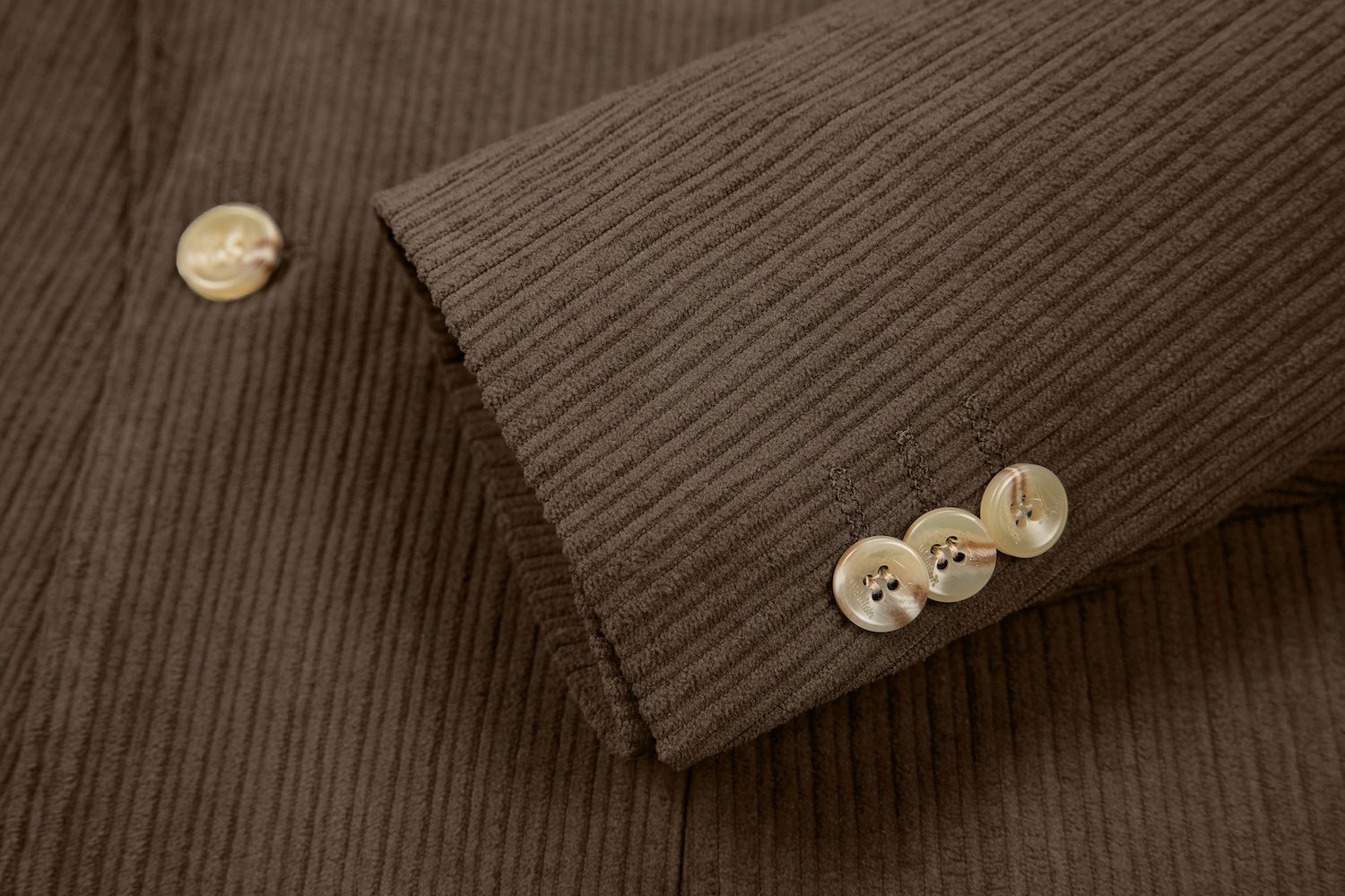 Cuff detail of dark brown corduroy prom blazer – formal sleeve with neat finish