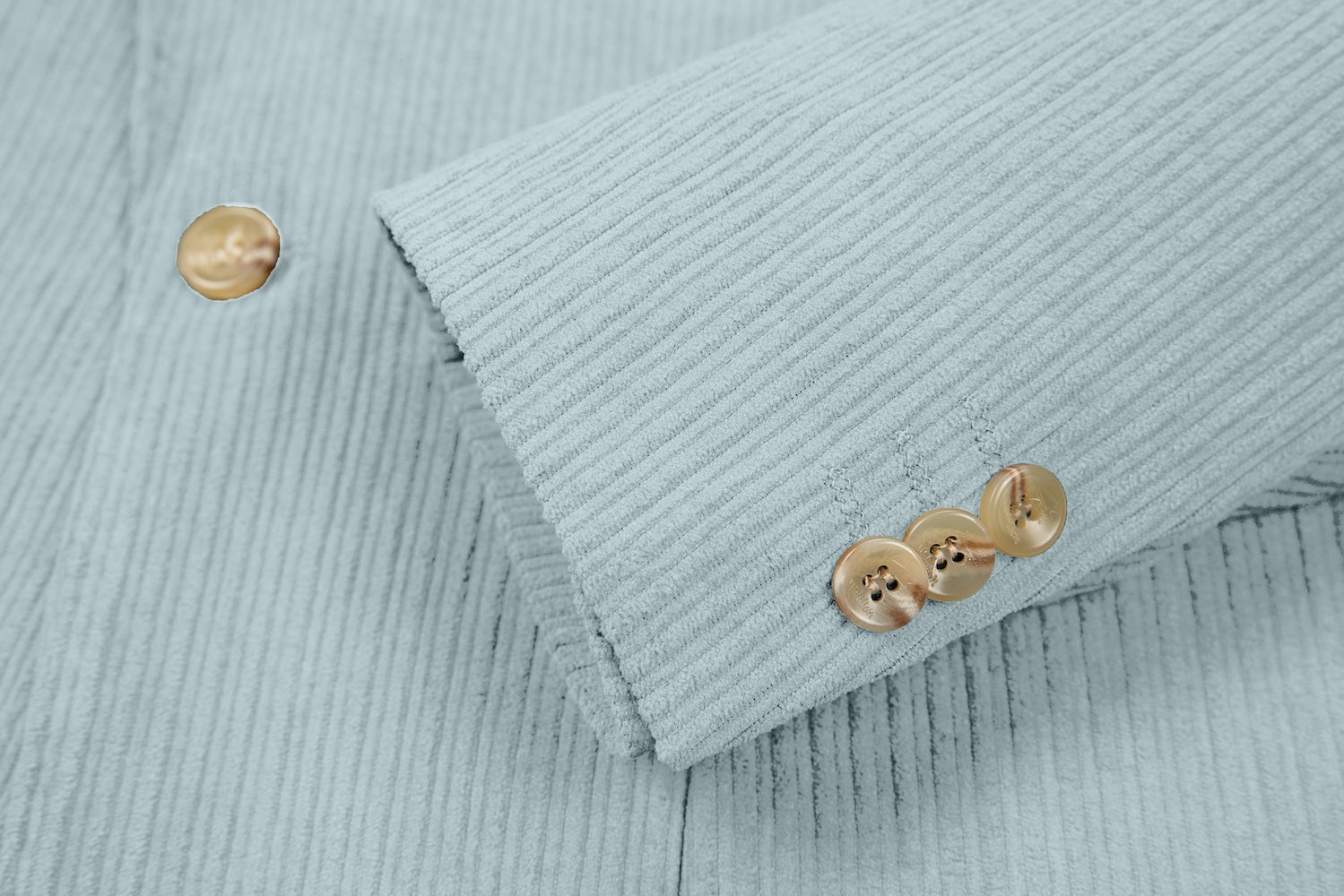 Cuff detail of light blue corduroy prom blazer – formal sleeve with neat finish
