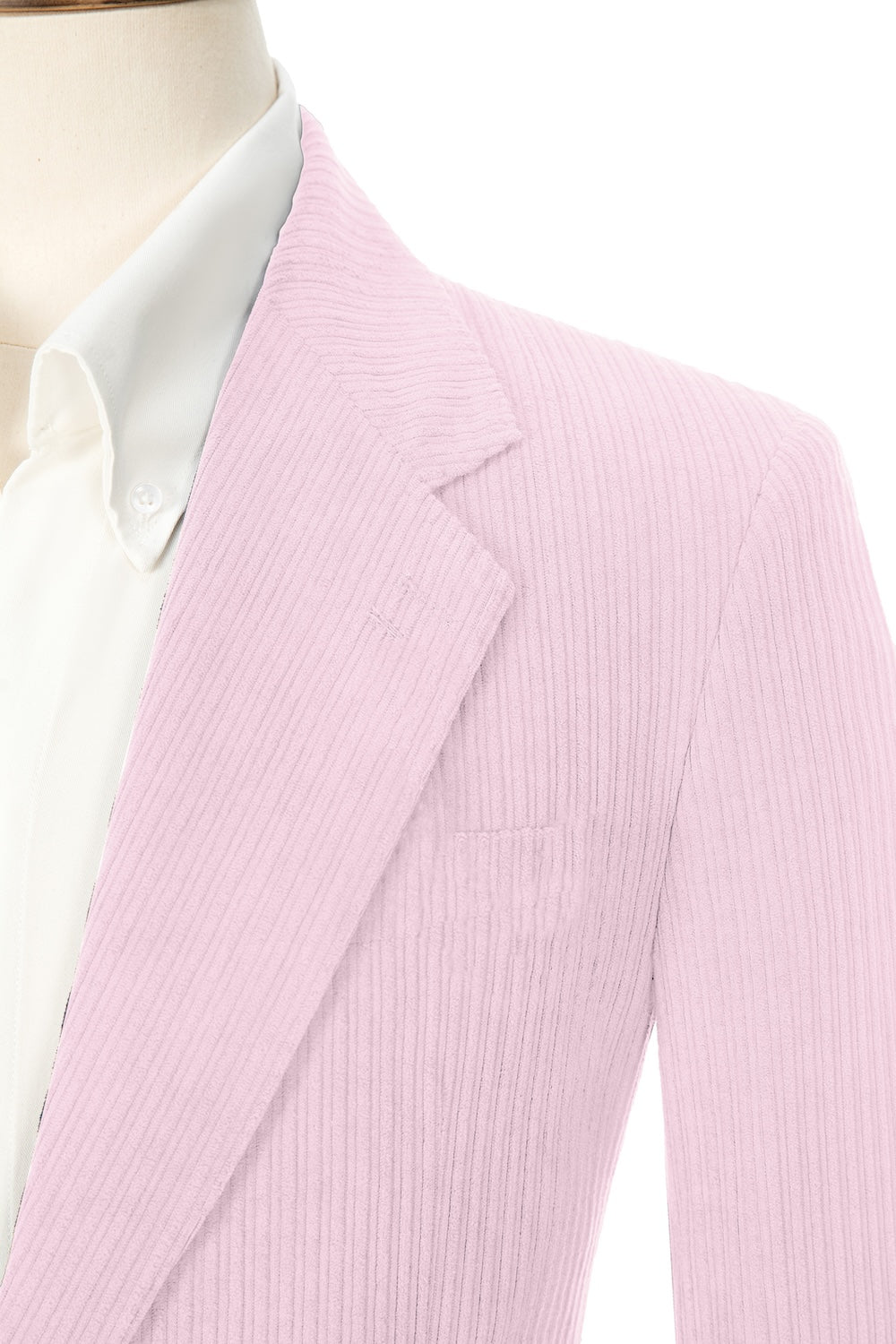 Close-up of light pink corduroy prom blazer lapel – textured fabric, elegant cut