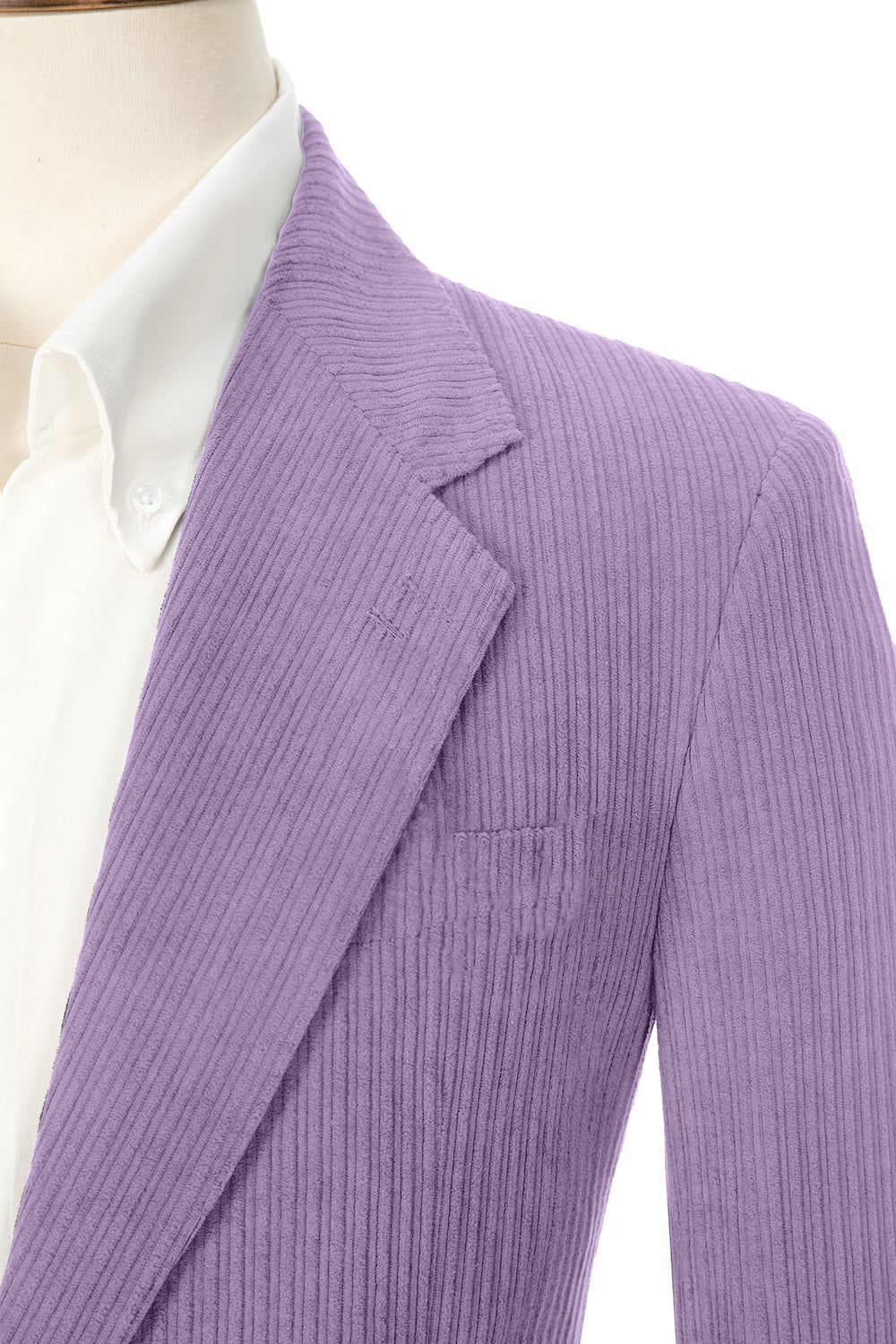 Close-up of purple corduroy prom blazer lapel – textured fabric, elegant cut