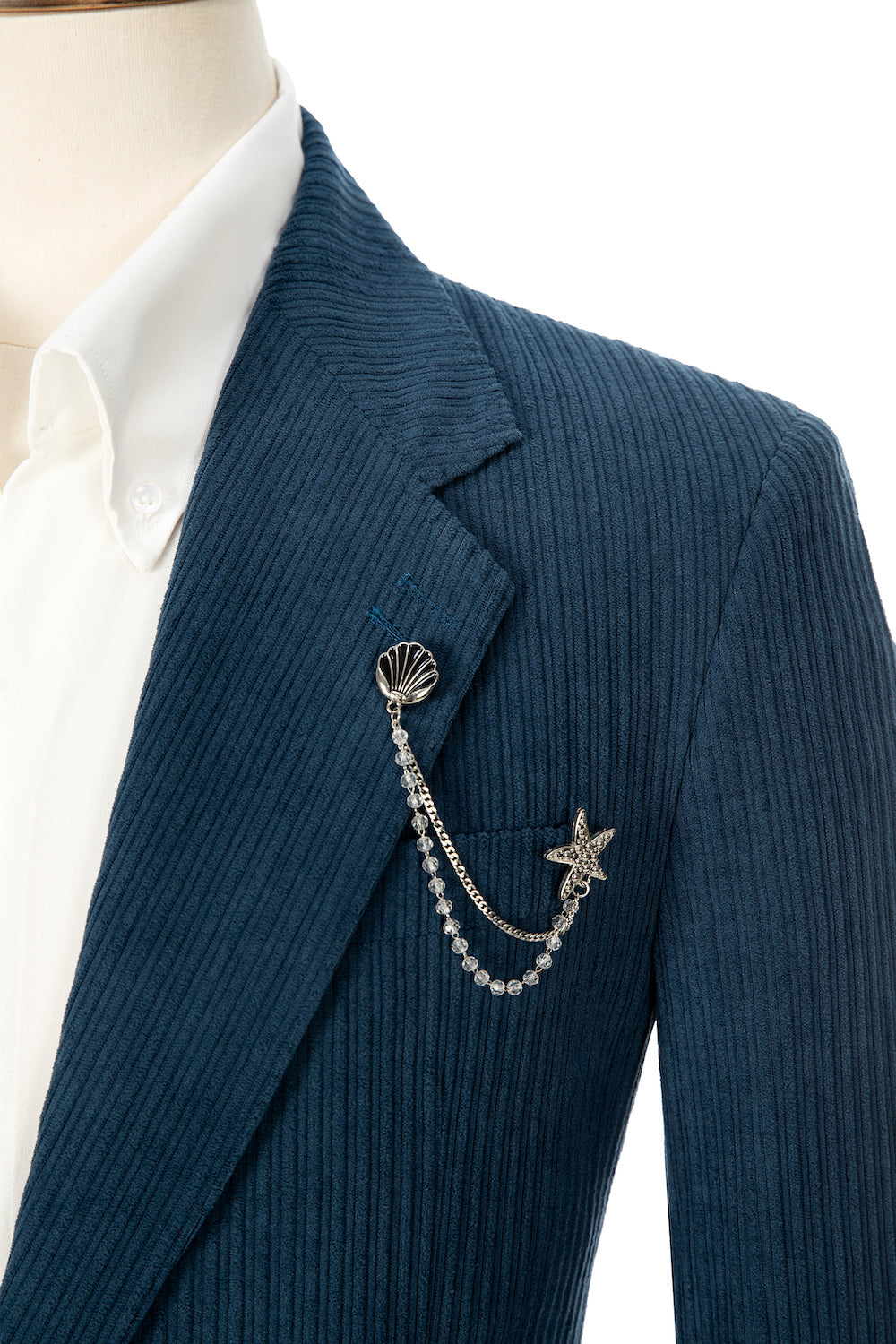 Close-up of royal blue corduroy prom blazer lapel – textured fabric, elegant cut