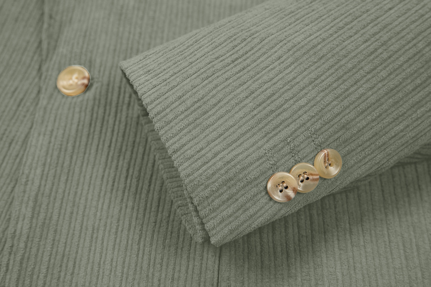 Cuff detail of sage green corduroy prom blazer – formal sleeve with neat finish