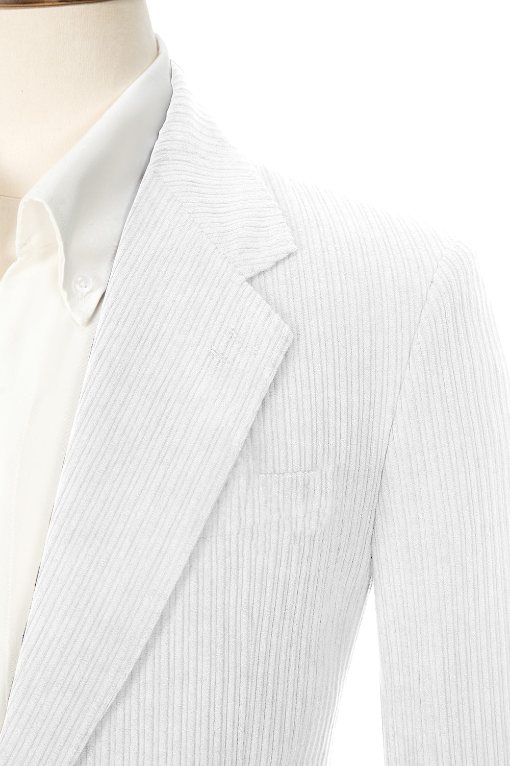 Close-up of white corduroy prom blazer lapel – textured fabric, elegant cut