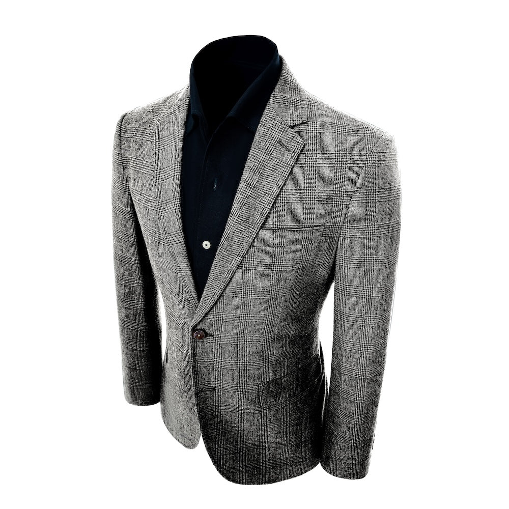 left side of blazer of men's black-and-white herringbone wool business suit