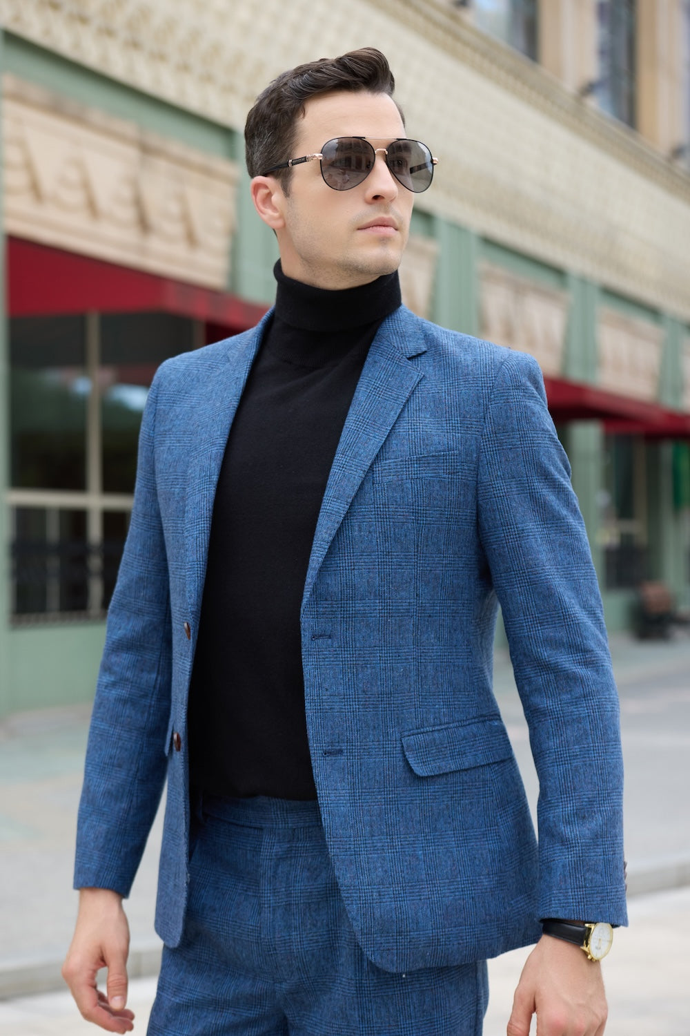 Side angle showing blue herringbone wool suit jacket details