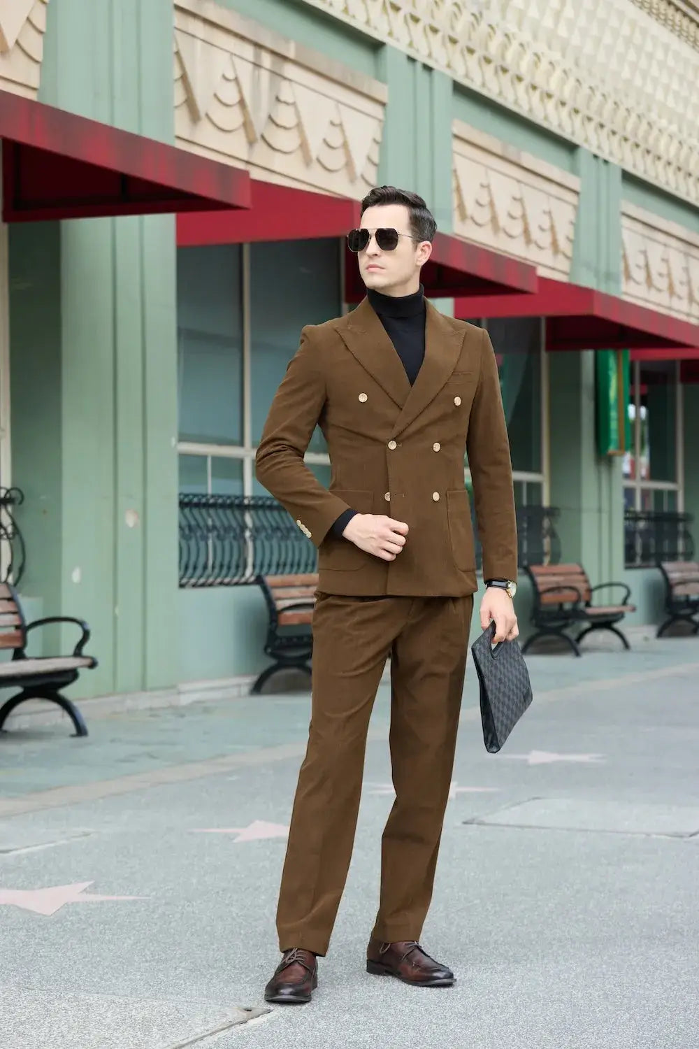 Men's full body shot in coffee corduroy suit – double breasted blazer and pants with peak lapel design