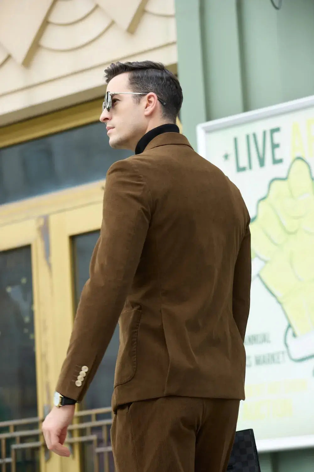 Side view of men's coffee corduroy 2 piece suit – retro blazer with structured shoulders and gold buttons